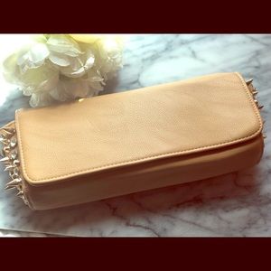 Beige leather clutch